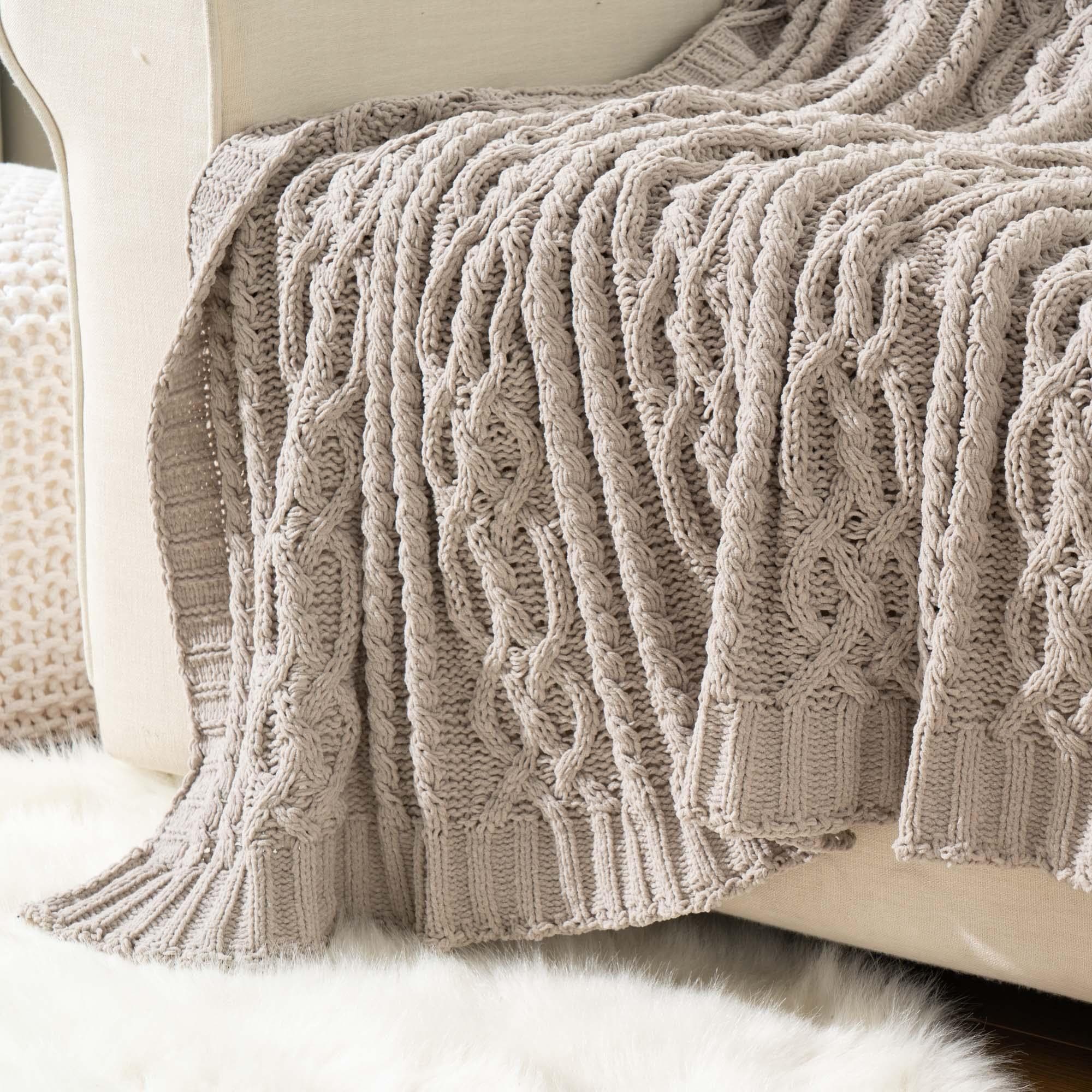 Cable knit store throw blanket